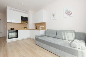 Living room - Cozy Apartment Lopuszanska by Renters (Warsaw)