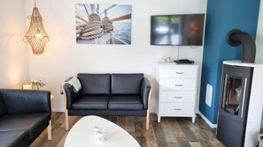 Fernseher, Kamin