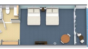 A 2-bedroom suite with a balcony, a bathroom, a small dining area, and a seating area by the window. - Embrace Coastal Living Oceanfront Room 11th Floor (Myrtle Beach)