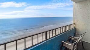 A balcony with a view of the beach and ocean. - Seascape Elegance Oceanfront Getaway 15th Floor (Myrtle Beach)