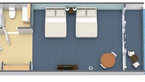 A room with two beds, a small table, a sofa, a window, and a view of the sea. - Embrace Coastal Living Oceanfront Room 9th Floor (Myrtle Beach)
