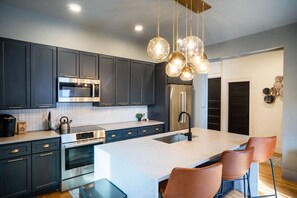 Fridge, microwave, oven, stovetop - The Buckeye Retreat Mansion (Columbus)