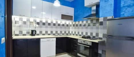 Family Apartment | Private kitchen | Fridge, oven, stovetop, electric kettle