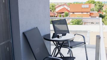 Habitación triple | Balcón