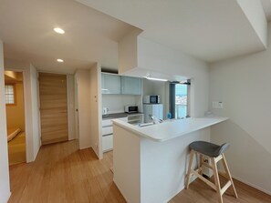 Premium Apartment, 3 Bedrooms | Private kitchen | Full-sized fridge, microwave, oven, stovetop - Shinkou House UE (Osaka)