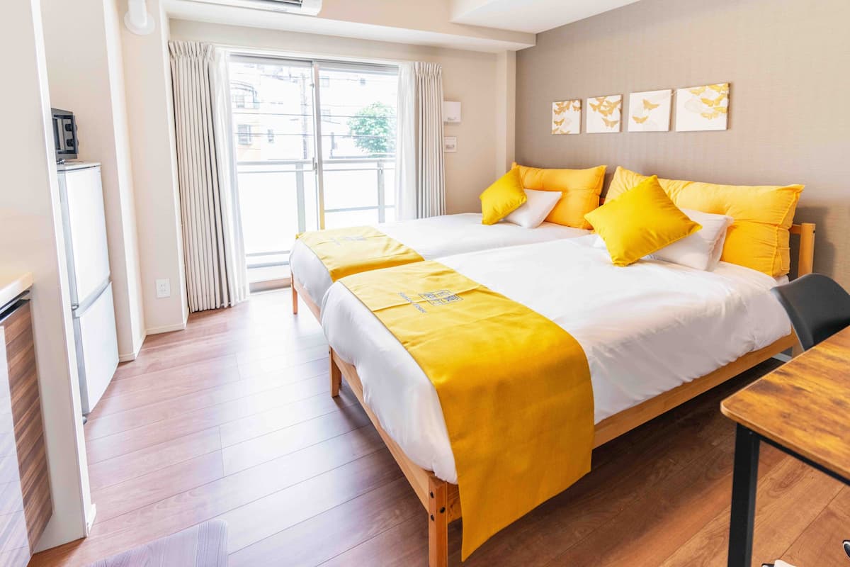 Apartemen Superior, 2 Tempat Tidur Twin, pemandangan kota | 2 kamar tidur, seprai premium, brankas, dan didekorasi berbeda-beda