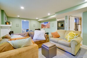 TV, fireplace, books