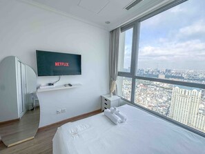 2 habitaciones, tabla de planchar con plancha, wifi y ropa de cama