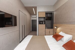 Apartamento básico | Cozinha americana privada | Frigobar, micro-ondas, cooktop, chapa