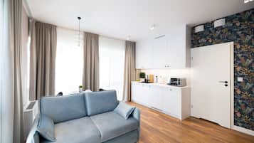 Business-Apartment | Wohnbereich | Flachbildfernseher