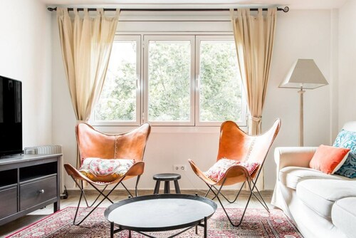 Enjoy a peaceful escape from the hustle and bustle of the city center in this thoughtfully designed apartment.