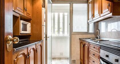 Enjoy a peaceful escape from the hustle and bustle of the city center in this thoughtfully designed apartment.