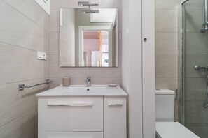 Hair dryer, towels, shampoo