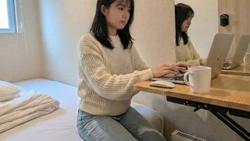 Economy Single Room | Blackout curtains, free WiFi, bed sheets