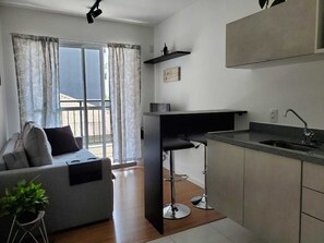 City Apartment | Living area - Sunflower Stays (São Paulo)