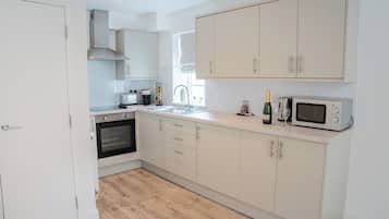 Cartmel - Our Premium Apartment | Private kitchen | Mini-fridge, microwave, toaster, highchair