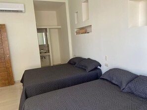 Premium bedding, down comforters, individually furnished