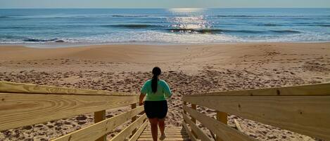 On the beach, sun loungers, beach towels