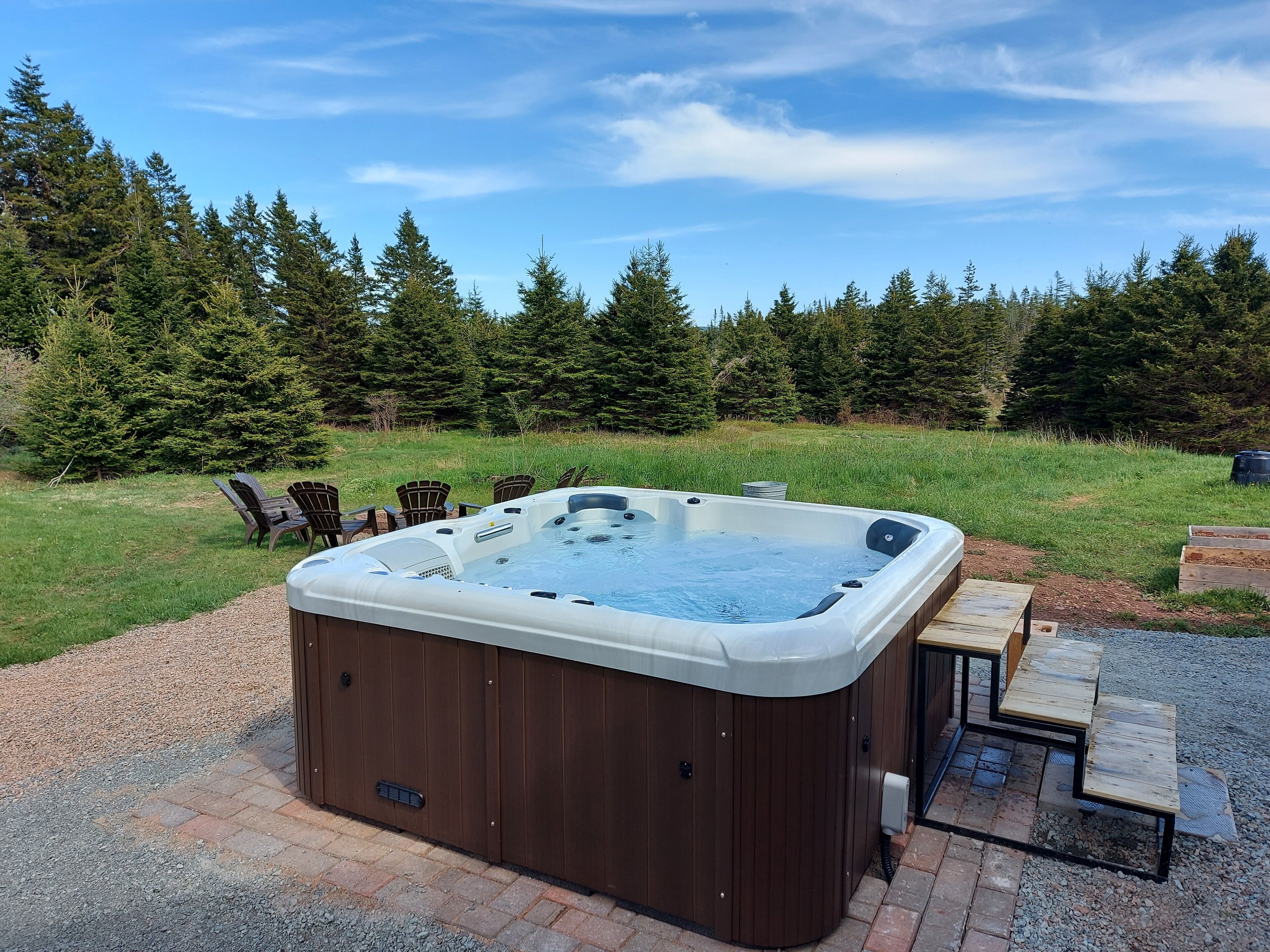 Our 6 person hot tub is situated out back behind a privacy fence. 