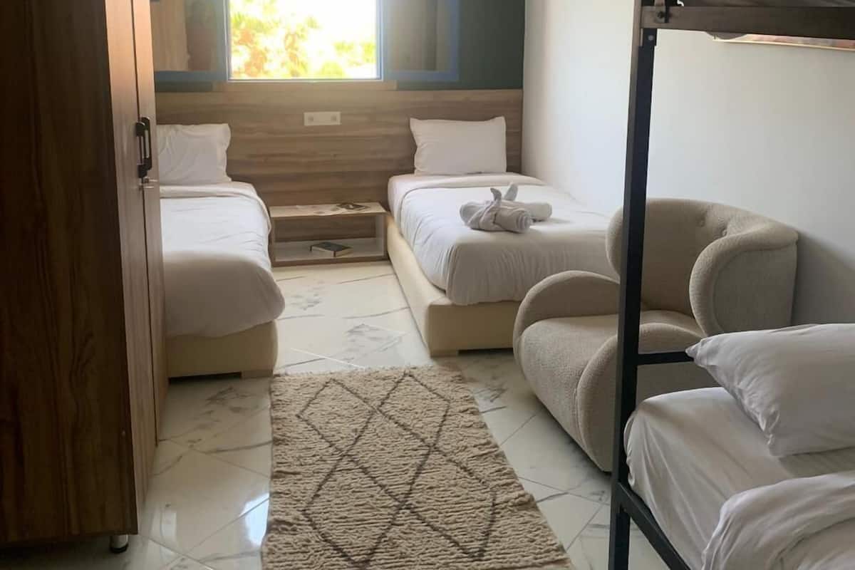 Familie vierpersoonskamer | 1 slaapkamer, een strijkplank/strijkijzer, gratis wifi, beddengoed