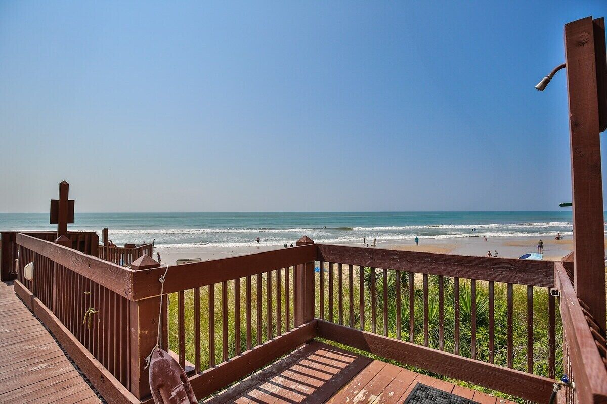 On the beach, sun loungers, beach towels