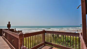 On the beach, sun loungers, beach towels