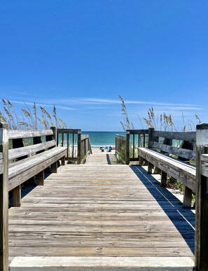 A wooden boardwalk leading to a beach with clear skies. - Sound Front-Beach Access & Pool - Linens Included! (North Topsail Beach)