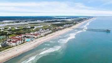 On the beach, sun loungers, beach towels