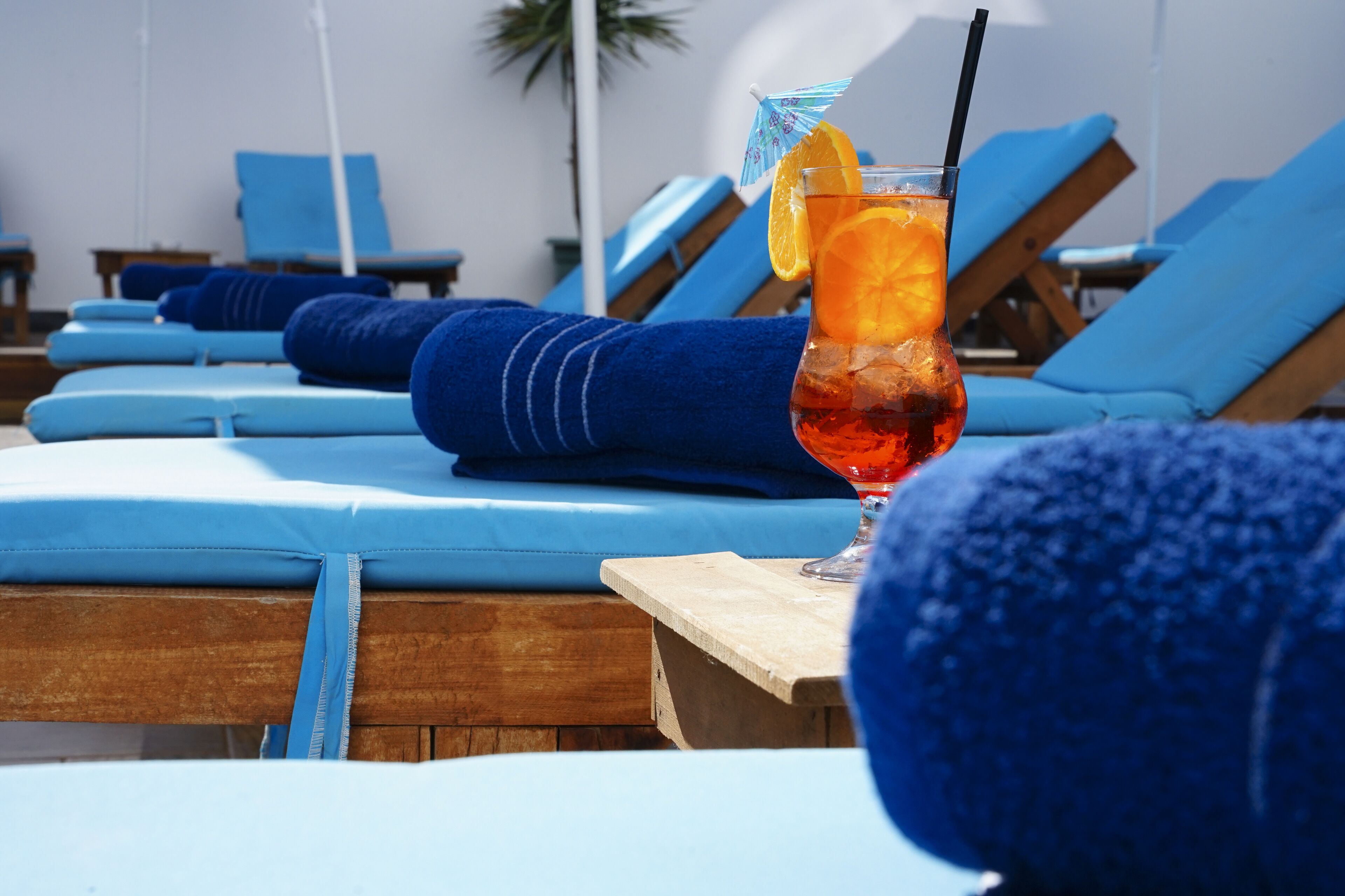 Seasonal outdoor pool, pool umbrellas, pool loungers