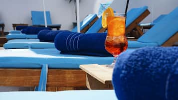 Seasonal outdoor pool, pool umbrellas, pool loungers