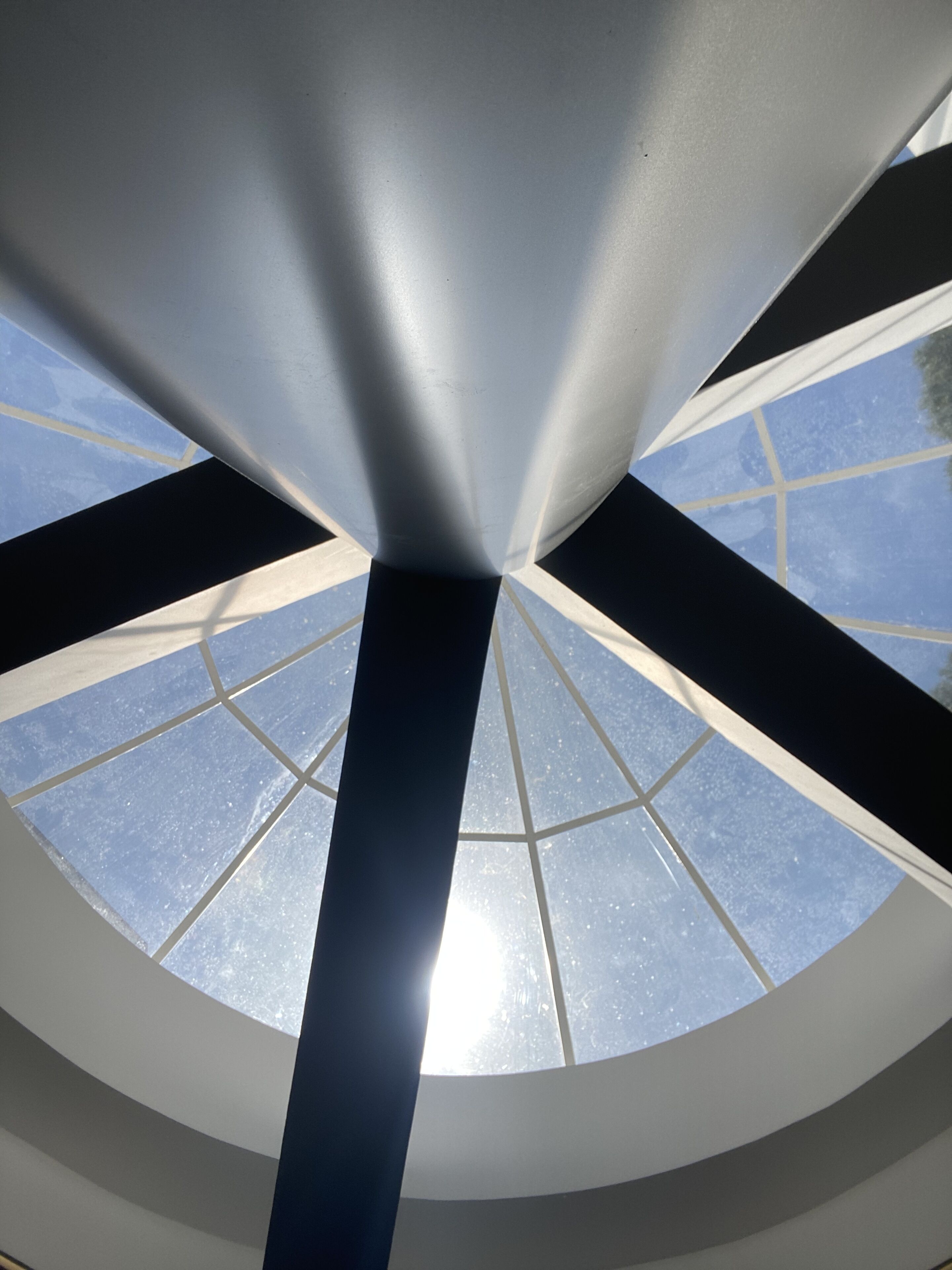 A skylight with a geometric glass design.