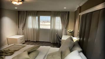 Suite familiar | 2 habitaciones, ropa de cama de alta calidad y decoración personalizada