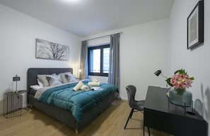 Apartamento, várias camas | 2 quartos, Wi-Fi de cortesia, roupa de cama