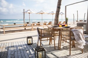Private beach, white sand, sun loungers, beach umbrellas