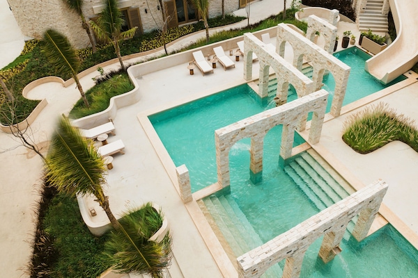 Outdoor pool, pool umbrellas, pool loungers