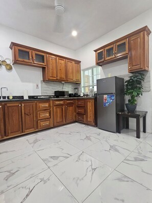 Fridge, microwave, stovetop, coffee/tea maker - Labelle Airport Condo
(Montego Bay)