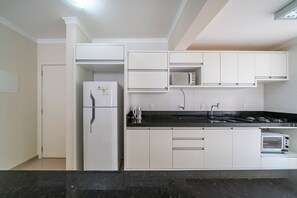 Apartment | Private kitchen | Blender, toaster oven, cleaning supplies, dining tables