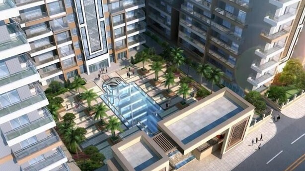 A high-rise residential building with multiple balconies, a central courtyard with palm trees, and a swimming pool.