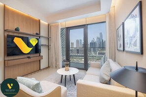 Luxury Apartment | Living area | 65-inch Smart TV with cable channels - Vogue | Address Opera near Burj Khalifa Dubai Mall (Dubai)