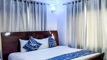 Desk, laptop workspace, blackout drapes, free WiFi