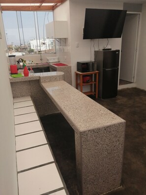 Frigorífic, microones i rentaplats