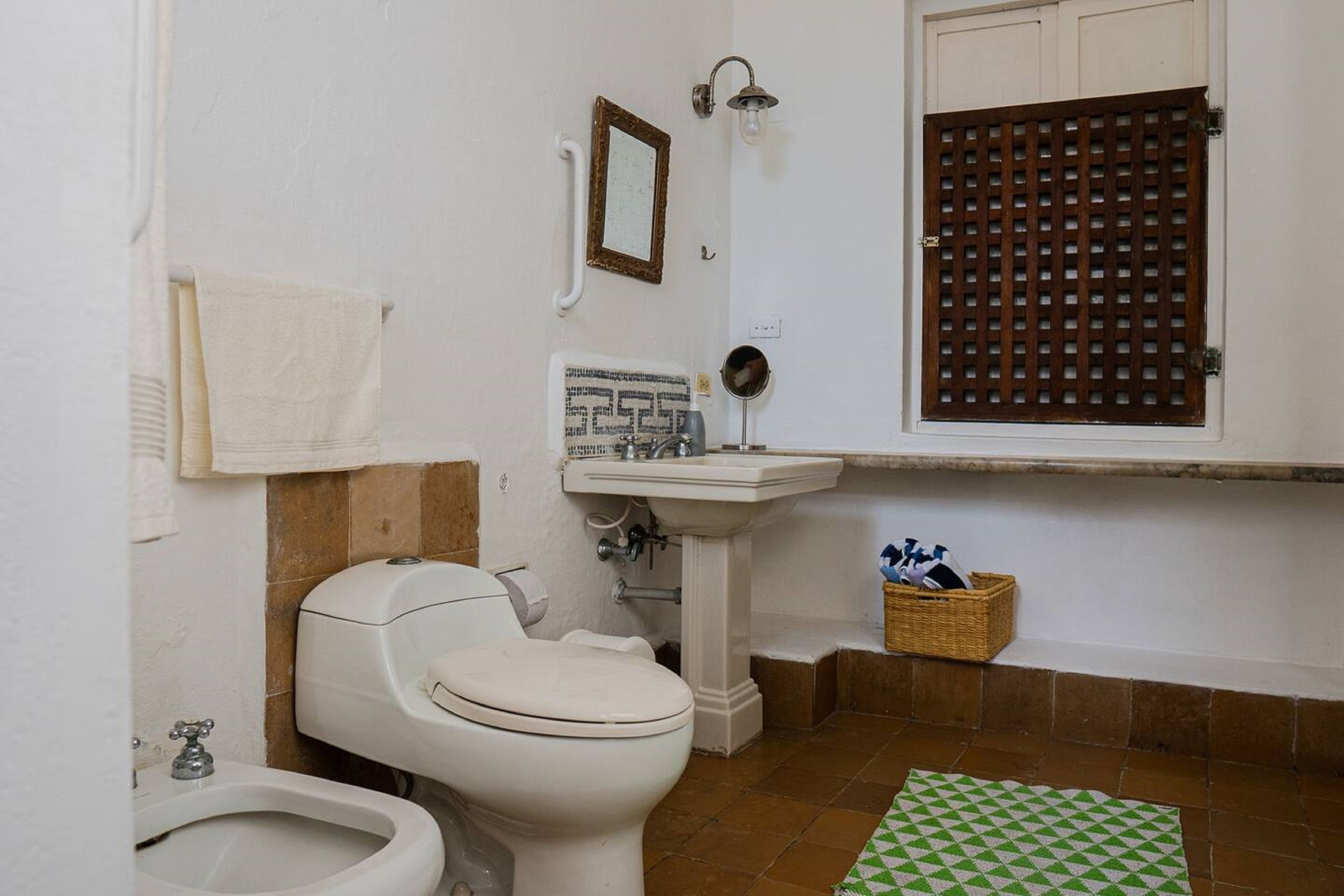 standard quadruple room | bathroom | shower, rainfall showerhead, hair dryer, heated floors