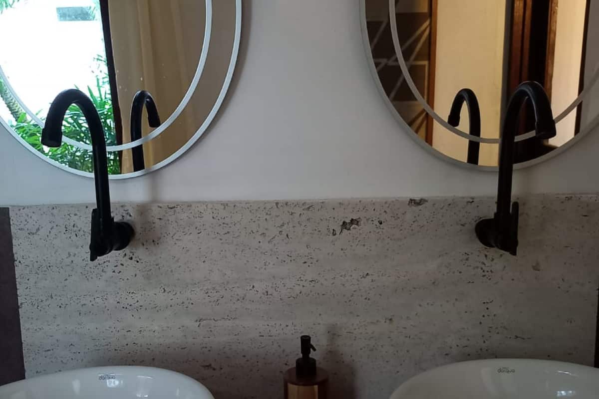 standard studio suite | bathroom | shower, rainfall showerhead, hair dryer, heated floors