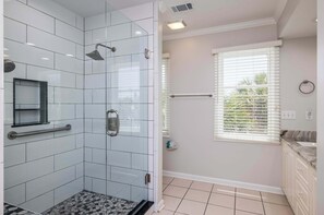 Shower, hair dryer, towels, shampoo