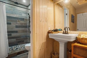 Shower, hair dryer, towels, shampoo