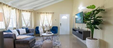 Comfort House | Living area | Flat-screen TV