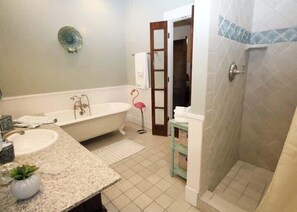 Shower, hair dryer, towels, shampoo