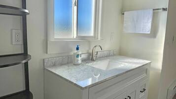 Hair dryer, towels, soap, shampoo
