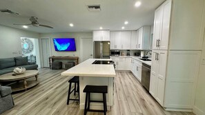 Fridge, microwave, stovetop, dishwasher - Darling Sunny's Cottage - Pup Friendly, Pool, Ground Level & Close to Restaurants & Shops (Sanibel)