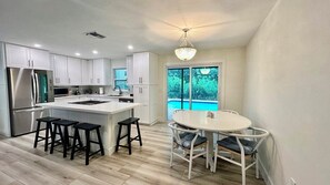 Fridge, microwave, stovetop, dishwasher - Darling Sunny's Cottage - Pup Friendly, Pool, Ground Level & Close to Restaurants & Shops (Sanibel)